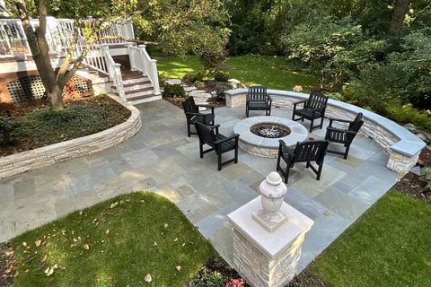 Backyard paver patio with firepit area 