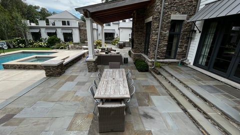 Large outdoor searing area and large paver patio with pool Rogers