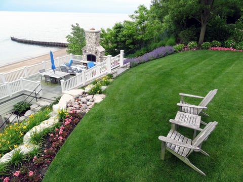 green grass overlooking patio and lake michigan