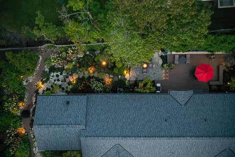 residential landscape design areial shot with landscape lighting